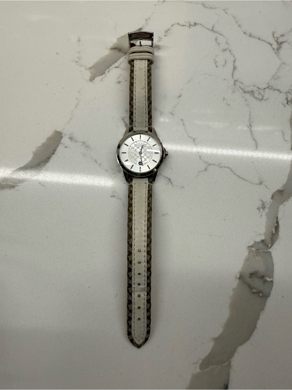 Coach women’s Watch with White Dial and Tan Logo-Trim Strap